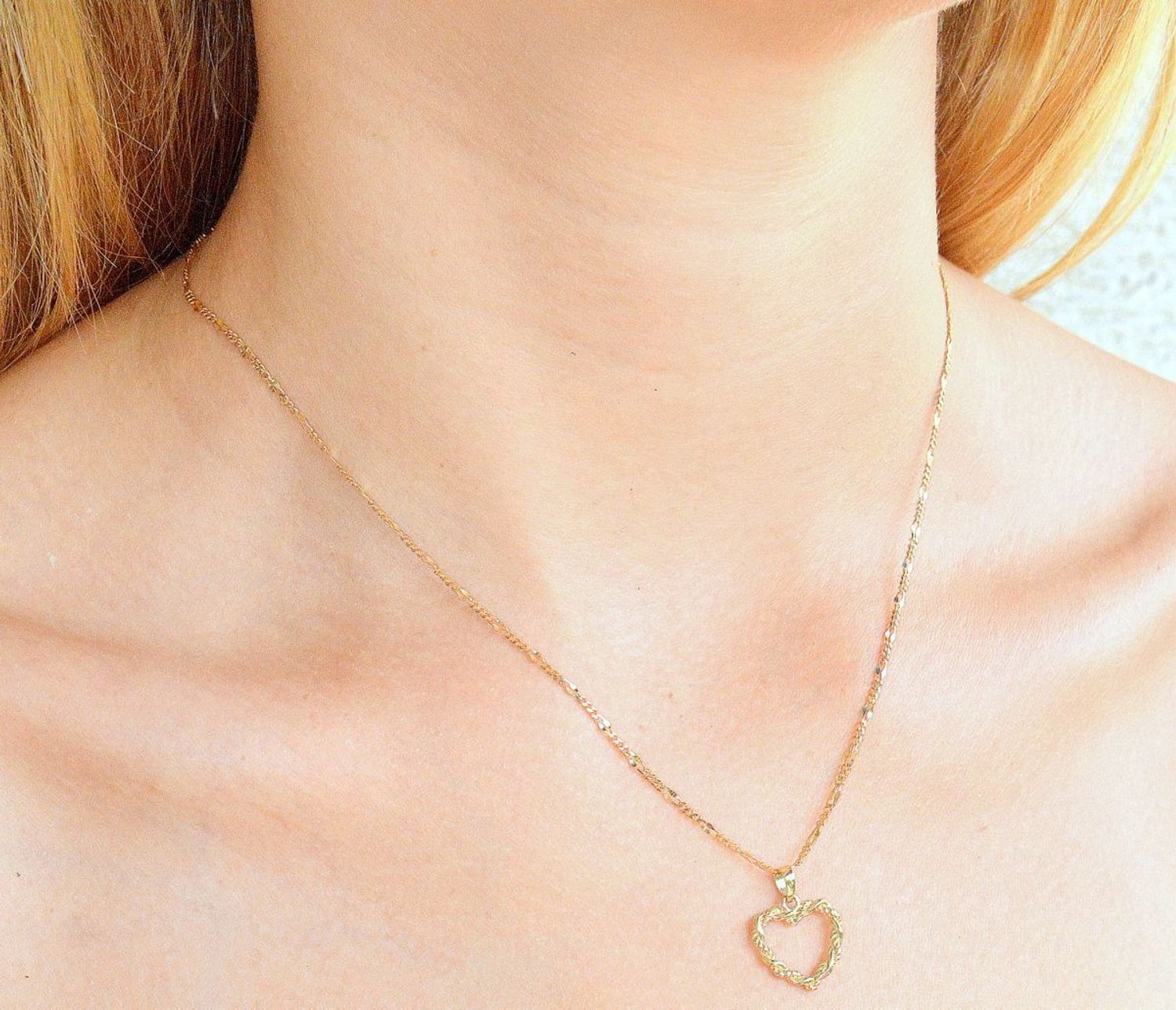 Złota zawieszka 375 plecione serduszko ZA 6795A 375. Złota zawieszka damska. Złota zawieszka serce próby 375. Złota zawieszka damska. Wisiorek serce. Złota zawieszka na prezent..jpg